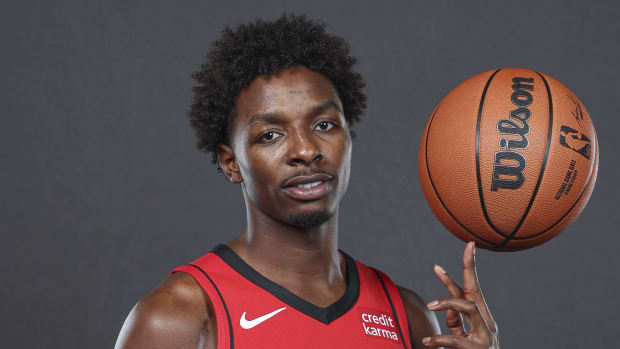 Rockets forward Jae'Sean Tate (8) poses for a picture at Rockets media day at Toyota Center.
